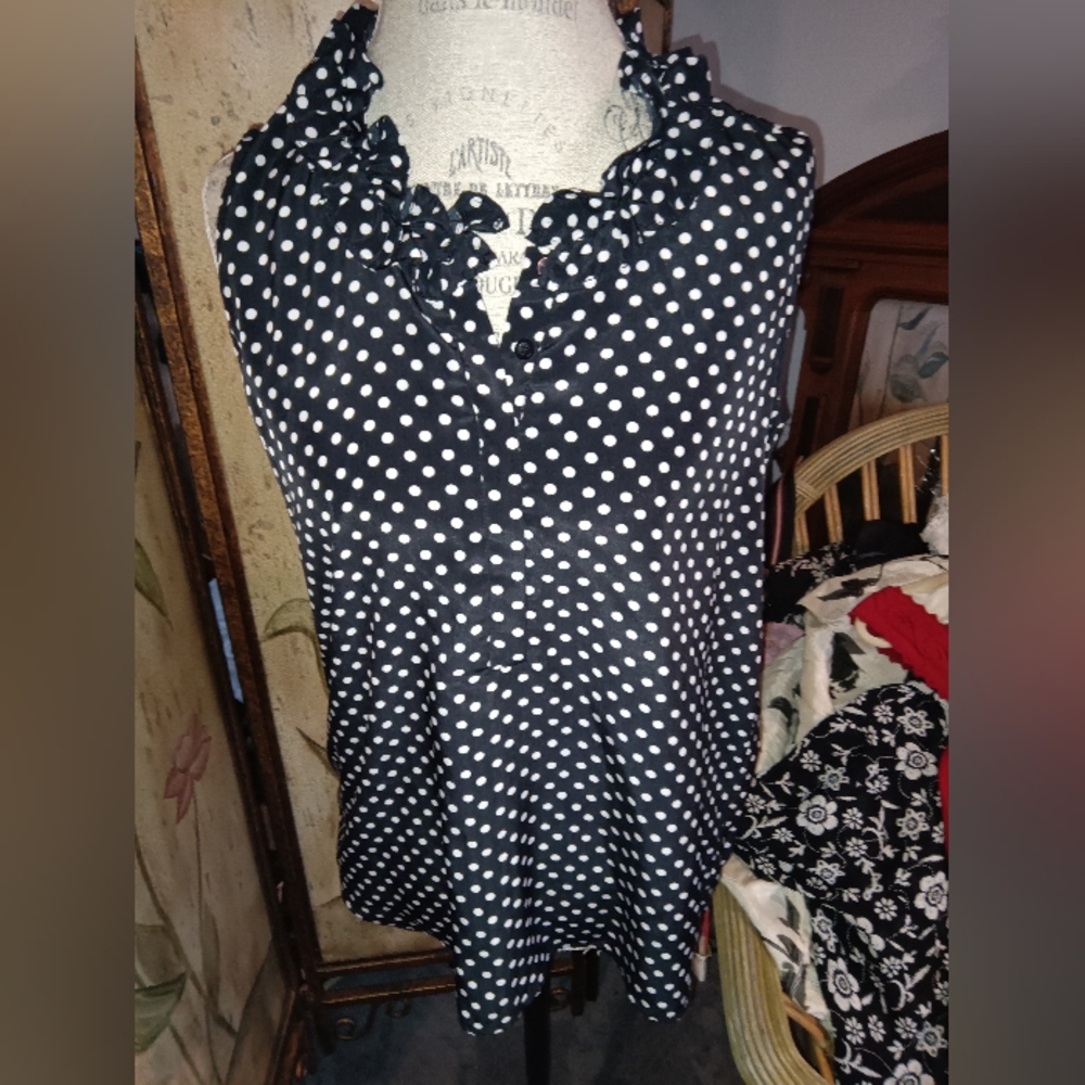 Sleeveless polka dot blouse